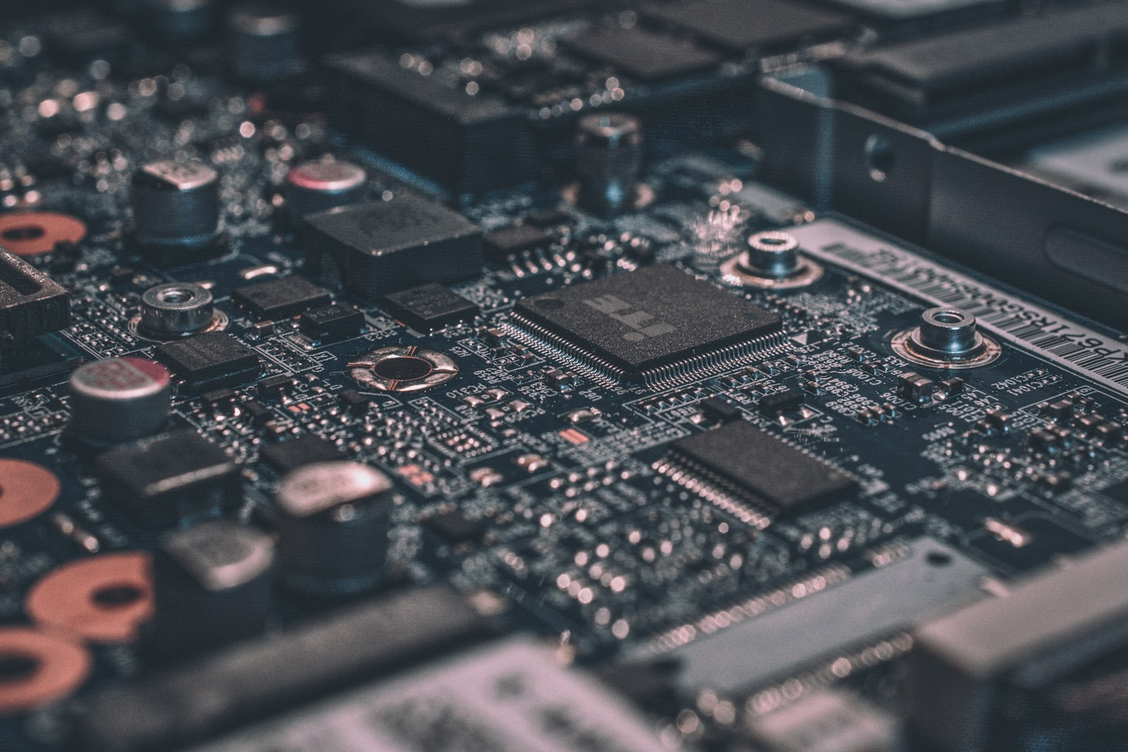 Close-up photograph of electronic chips and components mounted on a circuit board