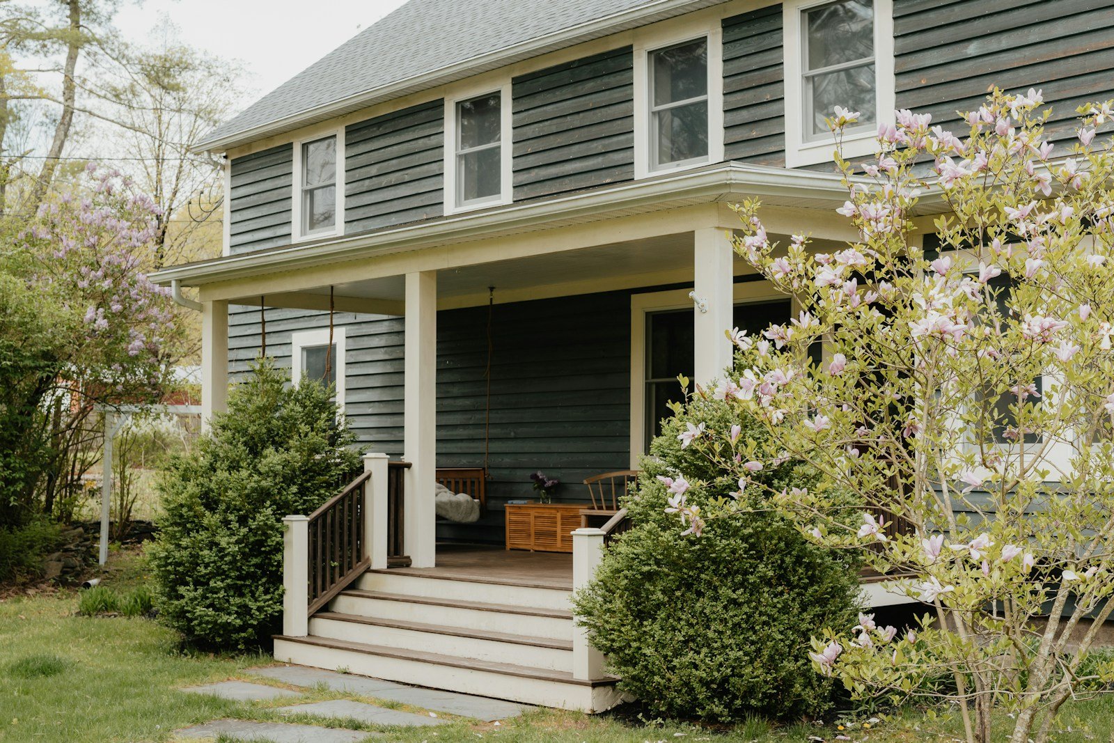 The covered porch of a country house in Pond Eddy, New York State. Apple has not announced any security camera; this image is illustrative.
